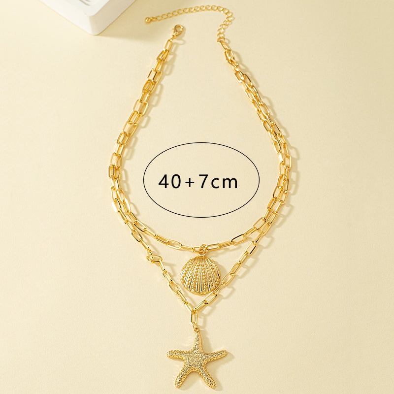 Seaside Star Necklace – Starfish & Shell Charm | Glisance
