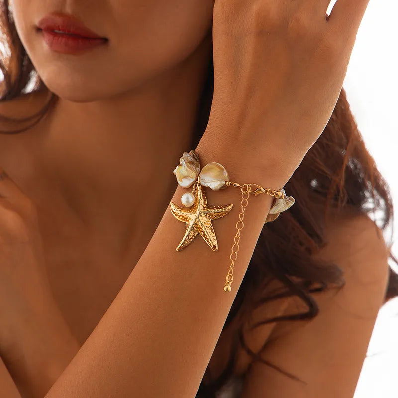 Seaside Charm – Starfish & Conch Vacation Bracelet