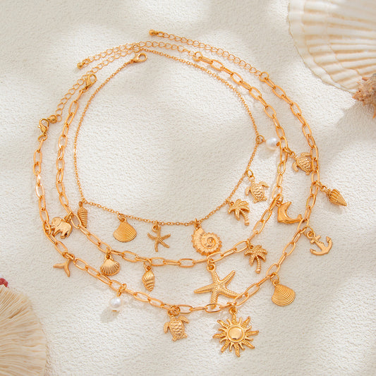 Tideplay Statement Necklace – Starfish, Fish & Pearl || Glisance